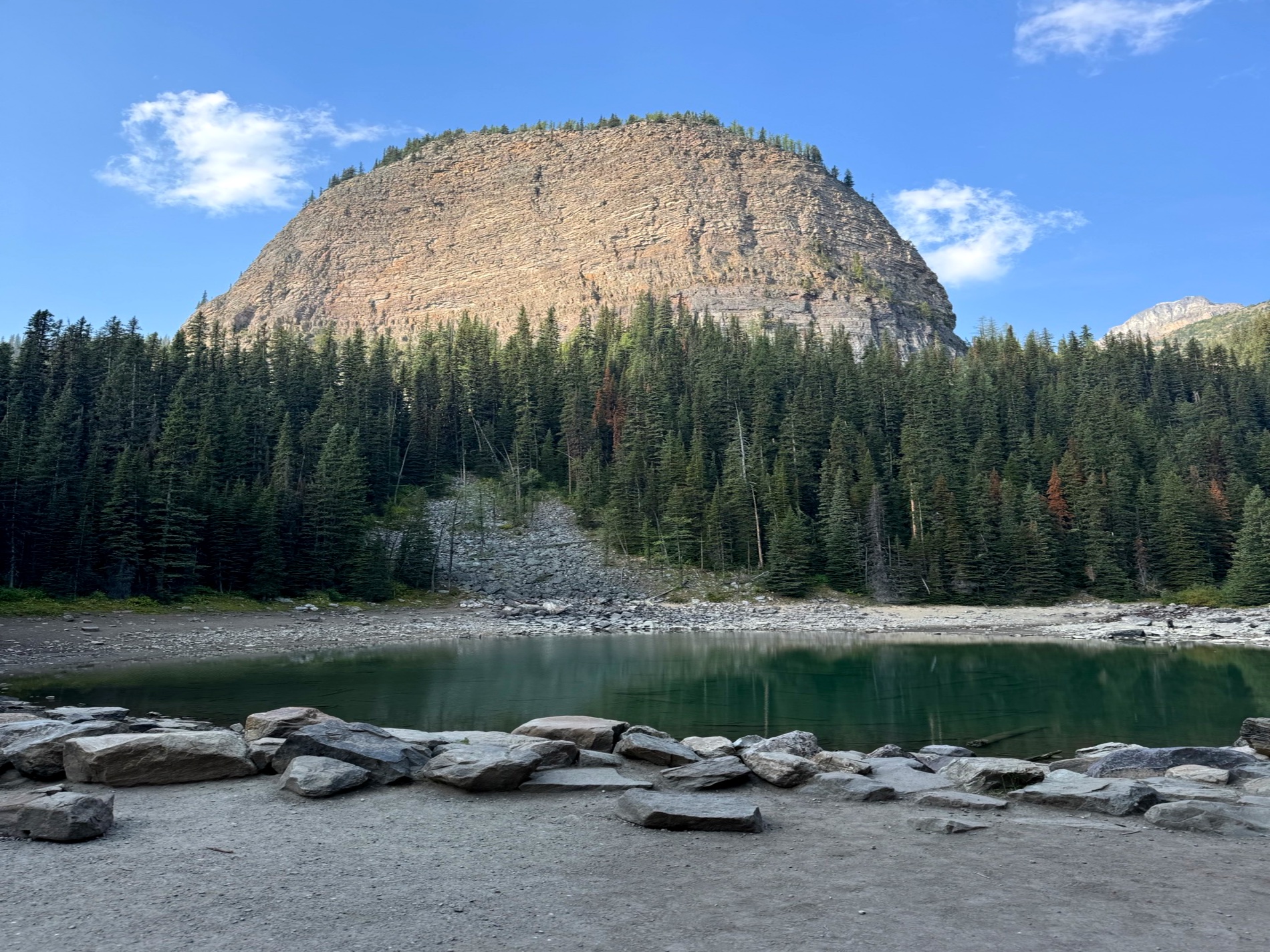 Lake Agnes below a rock face in the Canadian Rockies